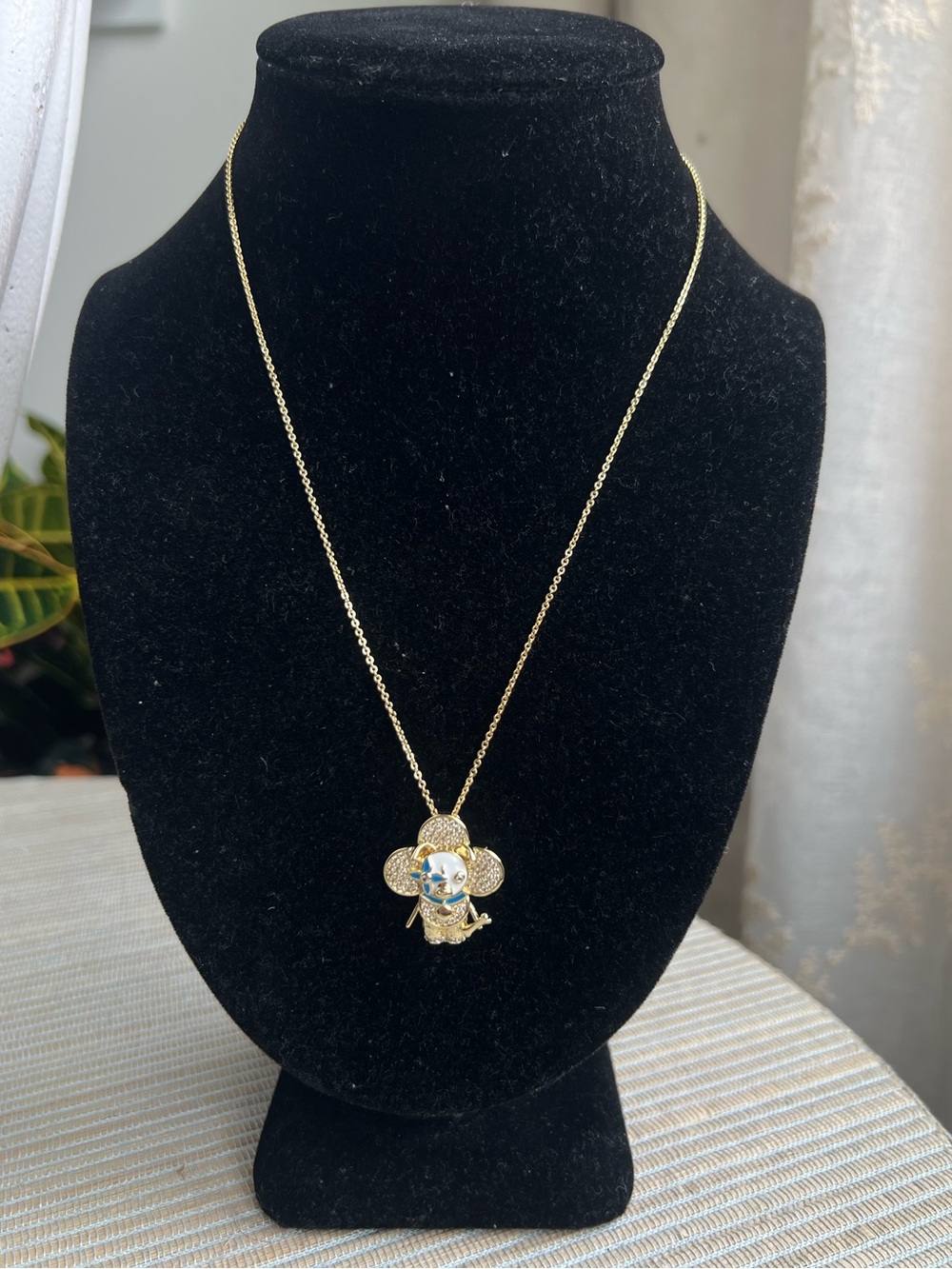 🩷-gold, blue and white pavé floral dog and bone pendant chain necklace